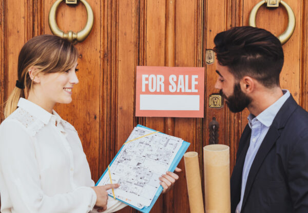 workmates-talking-about-house-s-plan Celebrity Brand Valuation
